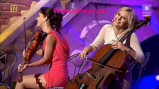 Violinists flash panties upskirt oops while performing live on stage