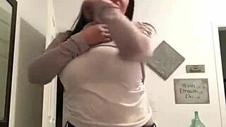 Hey, check out this tattooed amateur MILF stripping at home with her big tits out and clothes getting ripped off casually.