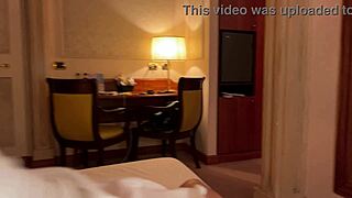 in a hotel room, this hot whore rides cowgirl and fucks doggystyle in front of the mirror, her big tits bouncing wildly.