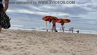 Milf blows big cock closeup on beach handjobs cumshot while crowds watch her tits