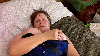 Granny Carmen Thrusts Vibrator Deep into Pussy for Explosive Orgasm in Lingerie
