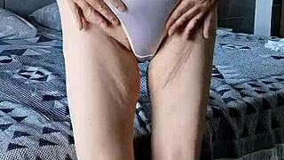 granny busts a big orgasm masturbating her shaved pussy with dildo