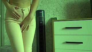 Amateur woman soaks jeans in desperate pee accident