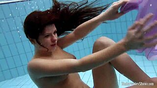 Aneta Splashes Big Tits in Purple Dress Pool Bath