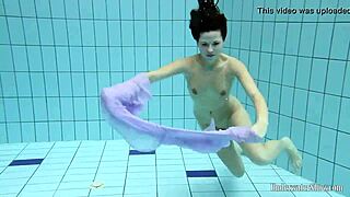 Aneta Splashes Big Tits in Purple Dress Pool Bath
