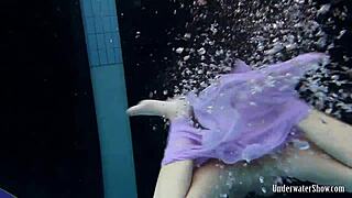 Aneta Splashes Big Tits in Purple Dress Pool Bath