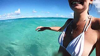 stroll turns into creamy kisses on the beach with this couple