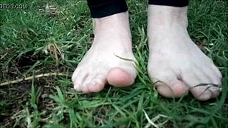 aus greek girl shows off her cute feet outdoors
