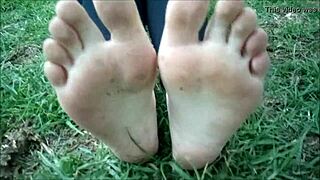 aus greek girl shows off her cute feet outdoors