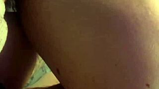 A girl stretches her asshole wide with a huge horse cock dildo for deep anal play.