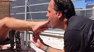 two barefoot amateurs worship one huge cock on the patio