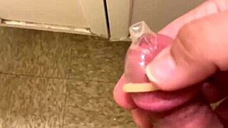 edging to orgasm while milking condom for solo pleasure