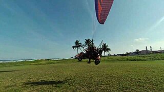 priscila belini strips bare mid-air on paramotor then fingers herself wild on beach
