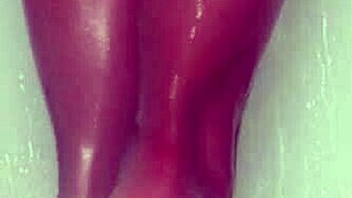 nylon feet tease and glisten under shower water in steamy bathroom display