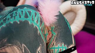 Dominatrix Trains Tattooed Kitty with Tail Buttplug in Femdom Catplay
