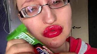 Giantess with huge lips and glasses smothers you with snickers bar fetish!
