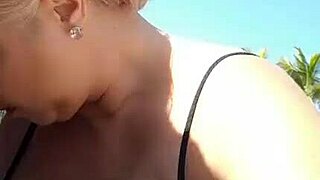 exhibitionist mature blonde flashes huge tits and big pussy on beach
