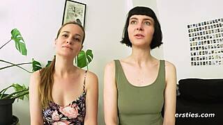 two german brunettes kiss suck nipples outdoors in public hallway