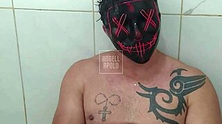 that masked tattooed bodybuilder steps into the shower strokes his toy hard till cum sprays everywhere alone