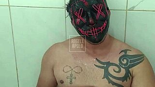 that masked tattooed bodybuilder steps into the shower strokes his toy hard till cum sprays everywhere alone